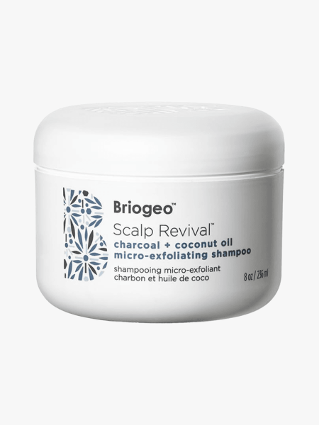 Briogeo Scalp Revival Charcoal + Coconut Oil Micro-Exfoliating Shampoo in branded component on a light gray background